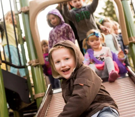 Children playing on a slide