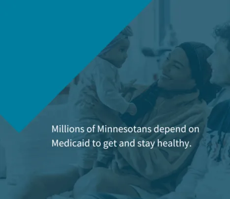 2 parents holding a child