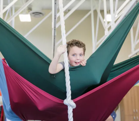 A child playing in ropes