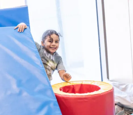 A smiling child playing