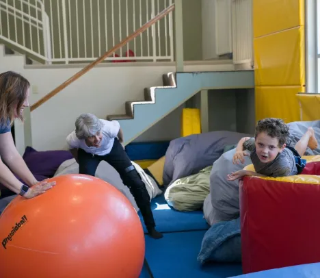 A child playing in a gym