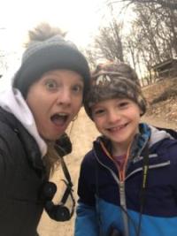 A selfie of a mom and son smiling
