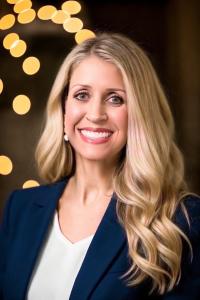 smiling blonde woman Hopfenspirger