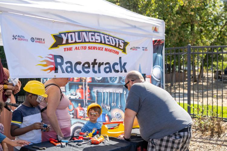 Toy race car activity at an event.