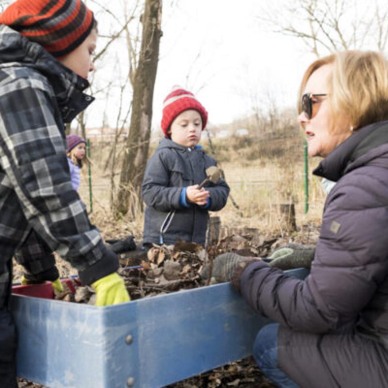 Kids working in a garden in winter