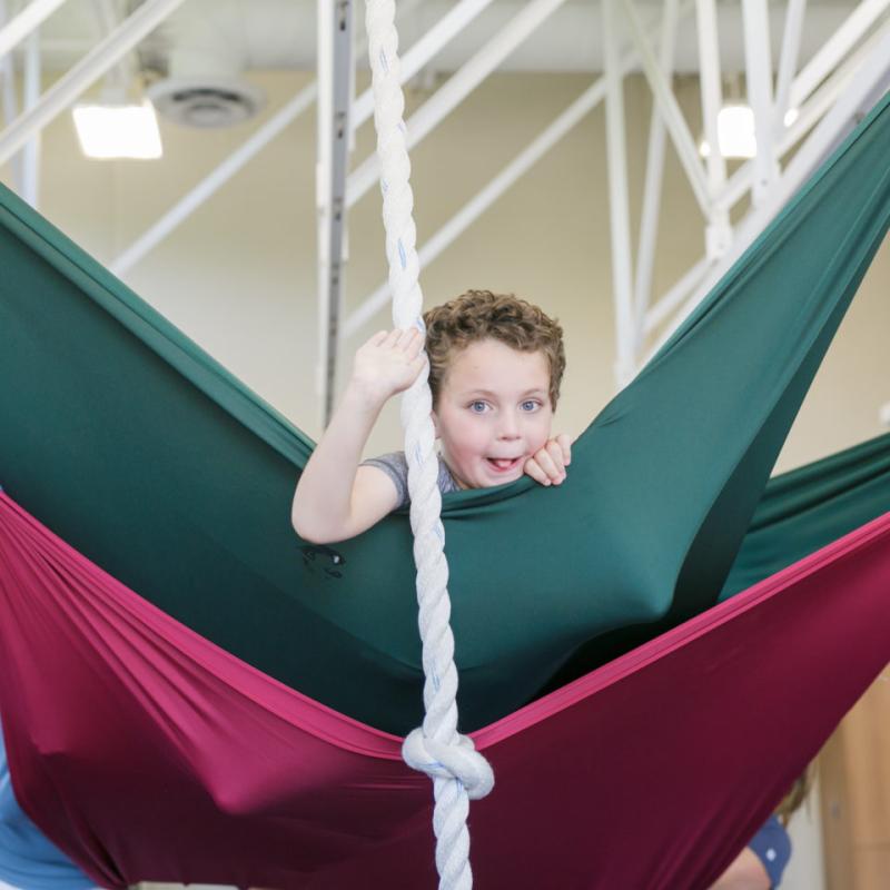 A child playing in ropes