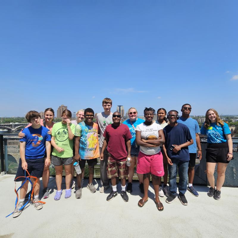 Group of adults with needs on a field trip with staff. 